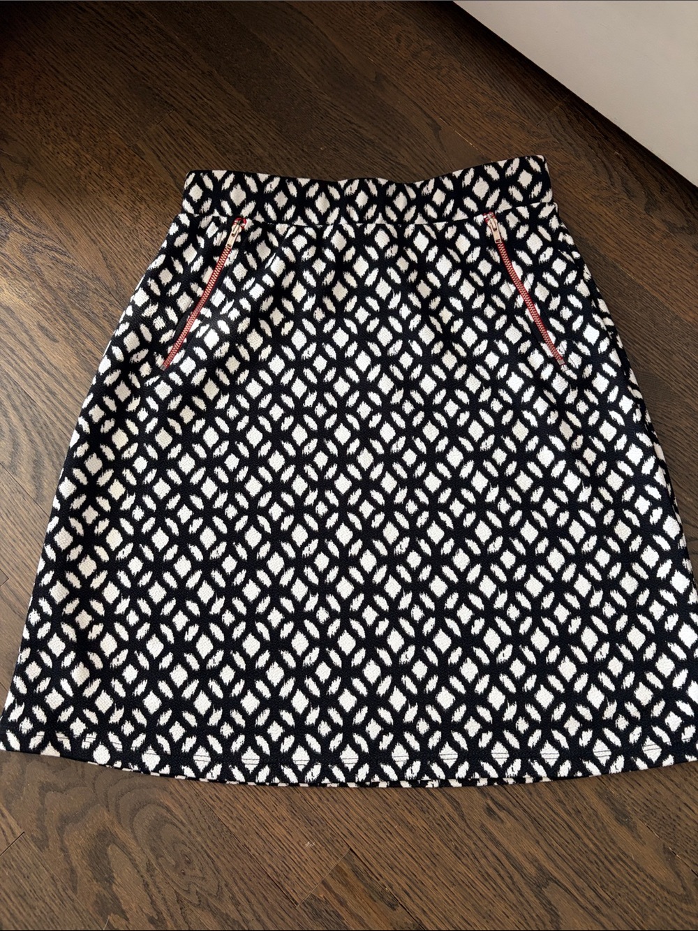 Le Lis Black and White Geometric A-Line Skirt with Red Zip Accents